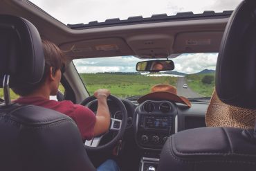 a man driving his car