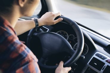 Cabin view of man driving a car