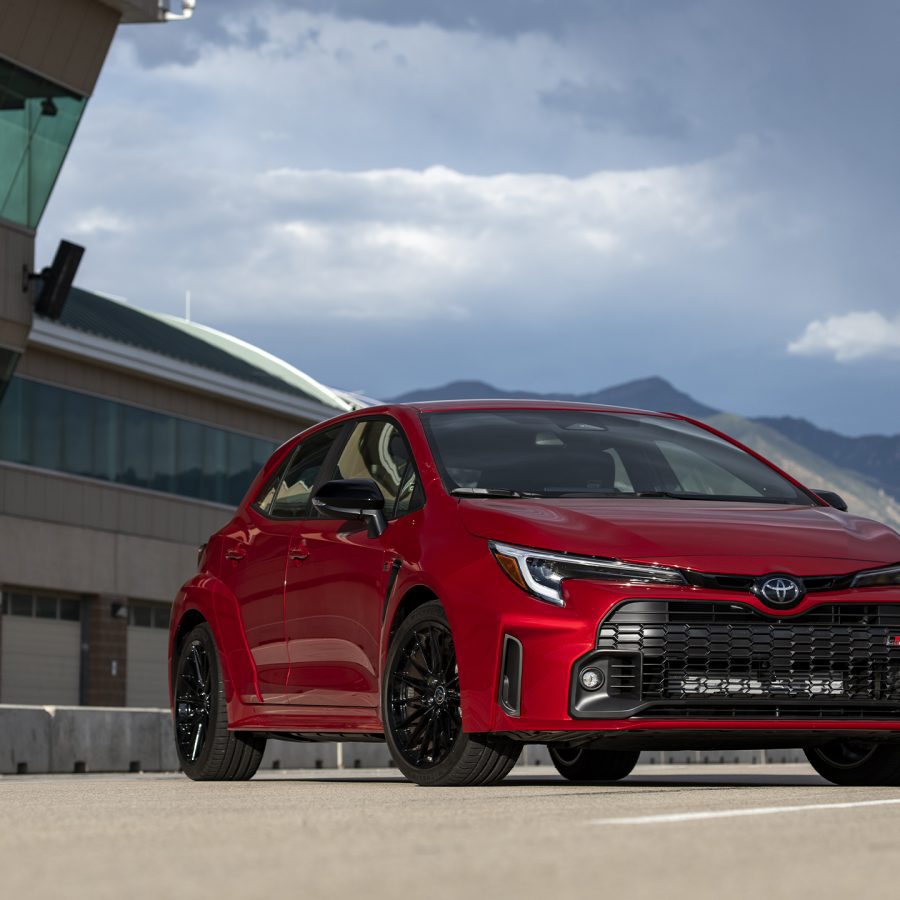 Three-quarter front view of a 2023 red Toyota GR Corolla