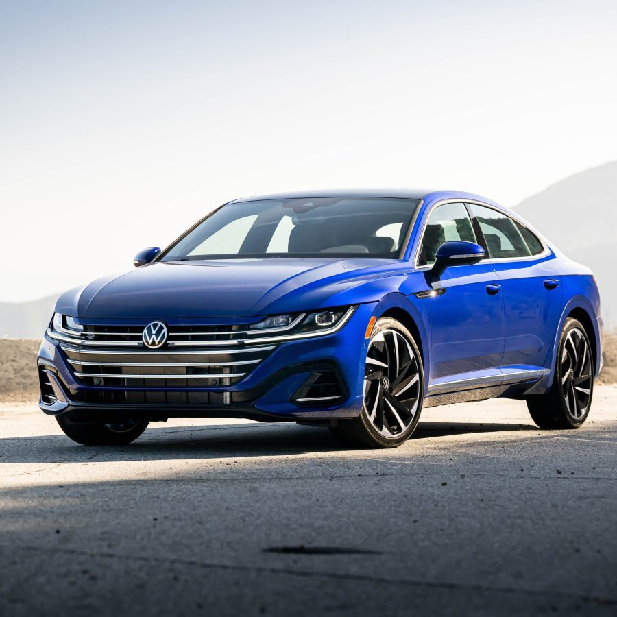 Three-quarter front view of a 2023 blue Volkswagen Arteon