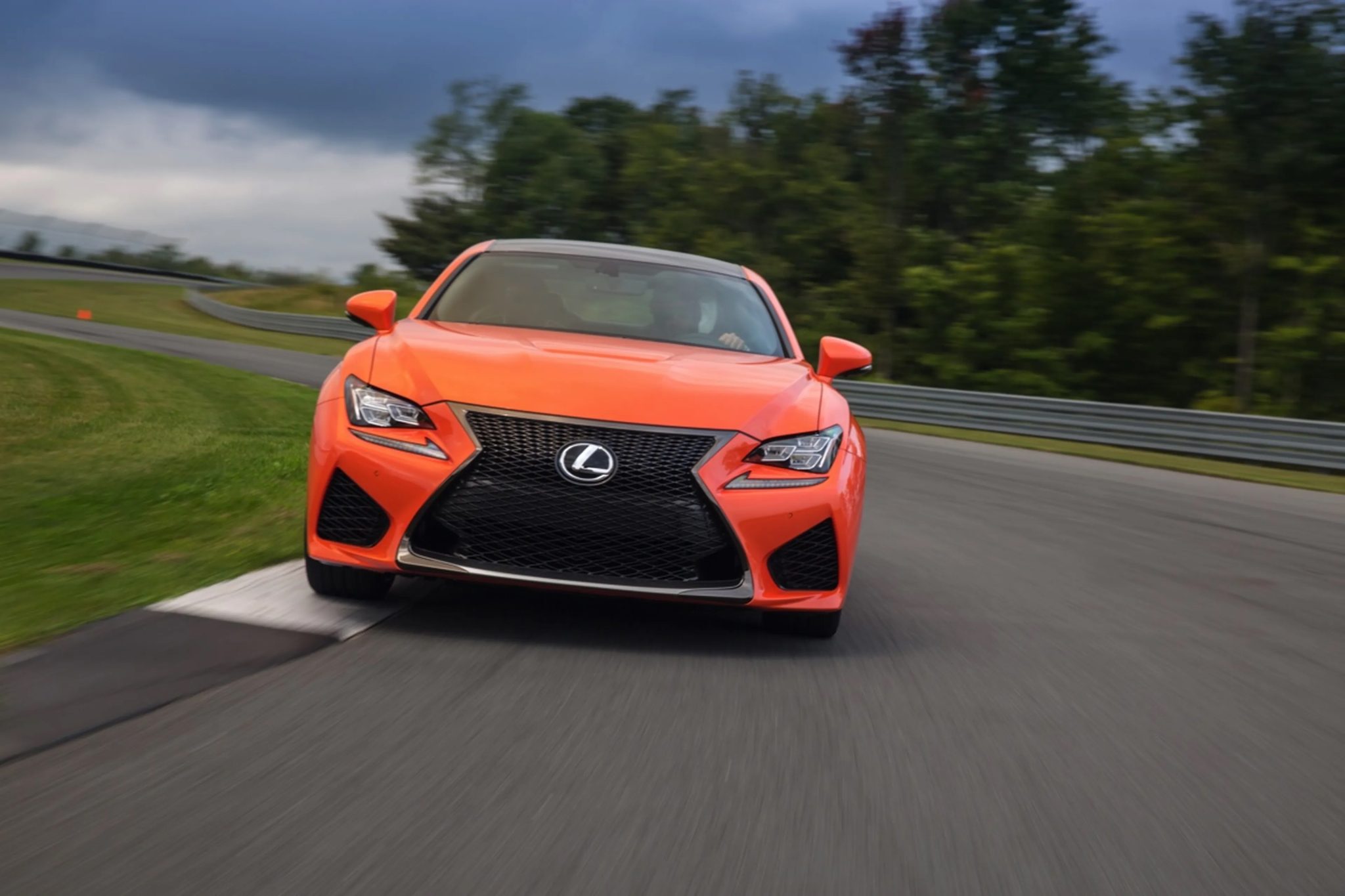 Front view of a 2024 orange Lexus RC F