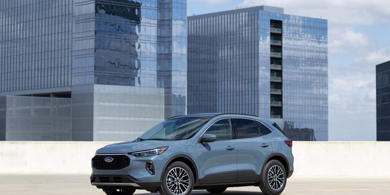 Three-quarter side view of a 2024 grey Ford Escape PHEV