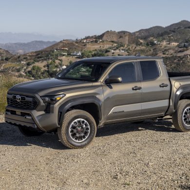 Side view of a 2024 grey Toyota Tacoma TRD Off Road on a trail